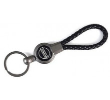 Брелок металл, кожа Ниссан черный на подвеске 13,5*3 см