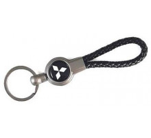 Брелок металл, кожа Митсубиси черный на подвеске 13,5*3 см