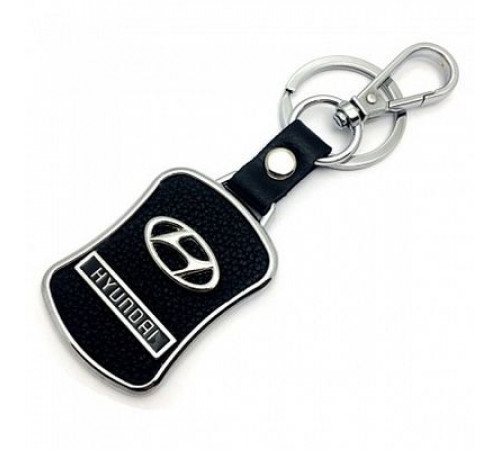 Брелок металл,кожа Хендай 3,8*7 см черный  логотип c надписью на подвеске